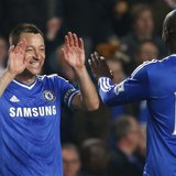 Chelsea's John Terry (L) celebrates with Demba Ba after defeating Tottenham Hotspur in their English Premier League soccer match at Stamford Chelsea's John Terry (L) celebrates with Demba Ba after defeating Tottenham Hotspur in their English Premier League soccer match at Stamford