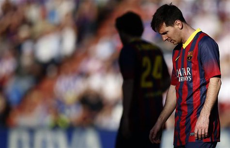 Barcelona's Lionel Messi reacts during his team's Spanish first division soccer match against Valladolid at Jose Zorilla stadium in Valladol Barcelona's Lionel Messi reacts during his team's Spanish first division soccer match against Valladolid at Jose Zorilla stadium in Valladol