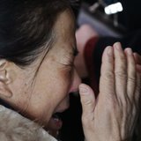 A relative of a passenger onboard Malaysia Airlines flight MH370 cries at the Beijing Capital International Airport in Beijing March 8, 2014.
REUTERS/Kim Kyung-Hoon A relative of a passenger onboard Malaysia Airlines flight MH370 cries at the Beijing Capital International Airport in Beijing March 8, 2014.
REUTERS/Kim Kyung-Hoon