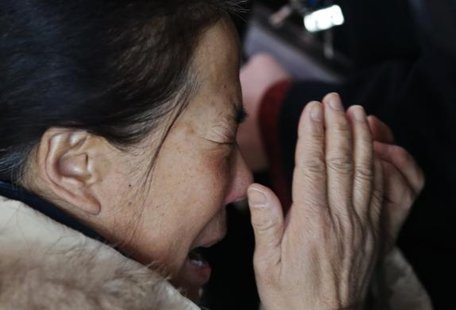 A relative of a passenger onboard Malaysia Airlines flight MH370 cries at the Beijing Capital International Airport in Beijing March 8, 2014.
REUTERS/Kim Kyung-Hoon A relative of a passenger onboard Malaysia Airlines flight MH370 cries at the Beijing Capital International Airport in Beijing March 8, 2014.
REUTERS/Kim Kyung-Hoon