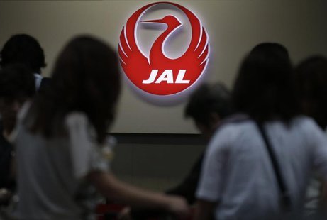 A logo of Japan Airlines is seen at the passengers' check-in counter at Haneda airport in Tokyo September 10, 2012. REUTERS/Toru Hanai A logo of Japan Airlines is seen at the passengers' check-in counter at Haneda airport in Tokyo September 10, 2012. REUTERS/Toru Hanai