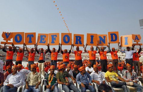Supporters of Gujarat's chief minister and Hindu nationalist Narendra Modi, the prime ministerial candidate for India's main opposition Bhar Supporters of Gujarat's chief minister and Hindu nationalist Narendra Modi, the prime ministerial candidate for India's main opposition Bhar
