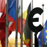 A statue depicting European unity is seen near EU flags outside the European Parliament in Brussels October 12, 2012. REUTERS/Francois Lenoi A statue depicting European unity is seen near EU flags outside the European Parliament in Brussels October 12, 2012. REUTERS/Francois Lenoi
