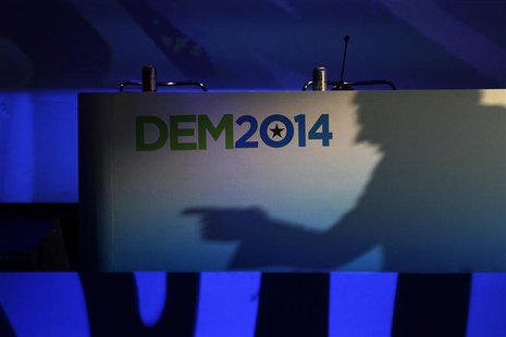 California Lt. Governor Gavin Newsom casts a shadow on a banner as he speaks at the 2014 California Democrats State Convention at the Los An California Lt. Governor Gavin Newsom casts a shadow on a banner as he speaks at the 2014 California Democrats State Convention at the Los An