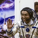International Space Station (ISS) crew member Japanese astronaut Koichi Wakata waves after donning a space suit shortly before the blast off International Space Station (ISS) crew member Japanese astronaut Koichi Wakata waves after donning a space suit shortly before the blast off