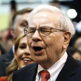 Berkshire Hathaway Chairman Warren Buffett reacts at a newspaper throwing competition before the company's annual meeting in Omaha May 4, 20 Berkshire Hathaway Chairman Warren Buffett reacts at a newspaper throwing competition before the company's annual meeting in Omaha May 4, 20