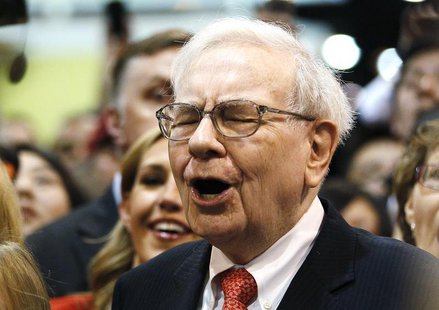 Berkshire Hathaway Chairman Warren Buffett reacts at a newspaper throwing competition before the company's annual meeting in Omaha May 4, 20 Berkshire Hathaway Chairman Warren Buffett reacts at a newspaper throwing competition before the company's annual meeting in Omaha May 4, 20