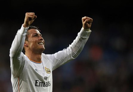 Real Madrid's Cristiano Ronaldo celebrates after scoring a goal against Levante during their Spanish first division soccer match at Santiago Real Madrid's Cristiano Ronaldo celebrates after scoring a goal against Levante during their Spanish first division soccer match at Santiago