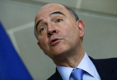 French Finance Minister Pierre Moscovici speaks to media after an official meeting with Swiss Finance Minister Eveline Widmer-Schlumpf in Be French Finance Minister Pierre Moscovici speaks to media after an official meeting with Swiss Finance Minister Eveline Widmer-Schlumpf in Be