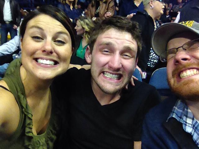 Jess, her boyfriend Mike and Jon smiling hard for George Strait (aka the Jon Henseler smile).
