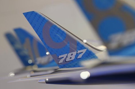 The tailwing of a model Boeing 787 Dreamliner aircraft is pictured at the Boeing booth at the Singapore Airshow February 11, 2014. REUTERS/E The tailwing of a model Boeing 787 Dreamliner aircraft is pictured at the Boeing booth at the Singapore Airshow February 11, 2014. REUTERS/E