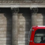 A man travels in a double-decker bus as it passes the Bank of England in central London March 24, 2010. REUTERS/Darrin Zammit Lupi A man travels in a double-decker bus as it passes the Bank of England in central London March 24, 2010. REUTERS/Darrin Zammit Lupi