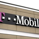 A T-Mobile store sign is seen in Broomfield, Colorado February 25, 2014. REUTERS/Rick Wilking A T-Mobile store sign is seen in Broomfield, Colorado February 25, 2014. REUTERS/Rick Wilking
