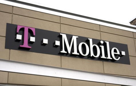 A T-Mobile store sign is seen in Broomfield, Colorado February 25, 2014. REUTERS/Rick Wilking A T-Mobile store sign is seen in Broomfield, Colorado February 25, 2014. REUTERS/Rick Wilking