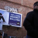 A pedestrian walks past an anti-bullying billboard in downtown Boston, Massachusetts March 3, 2011. REUTERS/Brian Snyder A pedestrian walks past an anti-bullying billboard in downtown Boston, Massachusetts March 3, 2011. REUTERS/Brian Snyder