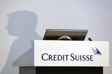 The shadow of Brady W. Dougan, CEO of Credit Suisse, is pictured before the full year results conference in Zurich February 6, 2014. REUTERS The shadow of Brady W. Dougan, CEO of Credit Suisse, is pictured before the full year results conference in Zurich February 6, 2014. REUTERS