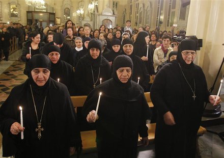 Head of Mar Thecla monastery in Maloula Mother Plagia Sayyaf (L), who was freed with others after being held by rebels for over three months Head of Mar Thecla monastery in Maloula Mother Plagia Sayyaf (L), who was freed with others after being held by rebels for over three months