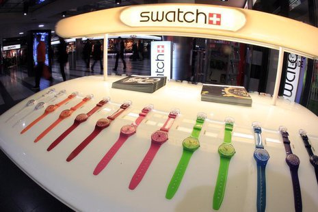 Swatch watches are displayed in front of a shop at the central station in Zurich February 4, 2013. REUTERS/Arnd Wiegmann Swatch watches are displayed in front of a shop at the central station in Zurich February 4, 2013. REUTERS/Arnd Wiegmann