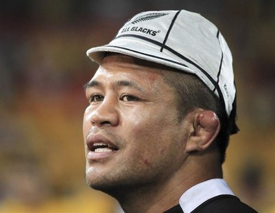 New Zealand All Blacks' Keven Mealamu wears a ceremonial cap signifying his 100th test match for New Zealand after their Bledisloe Cup rugby New Zealand All Blacks' Keven Mealamu wears a ceremonial cap signifying his 100th test match for New Zealand after their Bledisloe Cup rugby