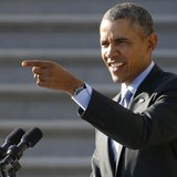 U.S. President Barack Obama points out a student taking a selfie as he arrives for remarks to welcomes NCAA champion athletes to the South L U.S. President Barack Obama points out a student taking a selfie as he arrives for remarks to welcomes NCAA champion athletes to the South L
