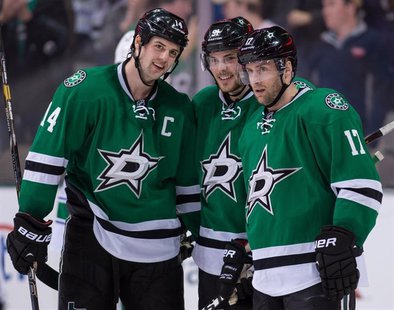 Mar 6, 2014; Dallas, TX, USA; Dallas Stars center Tyler Seguin (91) celebrates his hat trick with left wing Jamie Benn (14) and center Rich Mar 6, 2014; Dallas, TX, USA; Dallas Stars center Tyler Seguin (91) celebrates his hat trick with left wing Jamie Benn (14) and center Rich