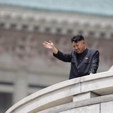 North Korean leader Kim Jong-un waves to the people during a parade to commemorate the 60th anniversary of the signing of a truce in the 195 North Korean leader Kim Jong-un waves to the people during a parade to commemorate the 60th anniversary of the signing of a truce in the 195