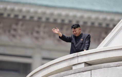 North Korean leader Kim Jong-un waves to the people during a parade to commemorate the 60th anniversary of the signing of a truce in the 195 North Korean leader Kim Jong-un waves to the people during a parade to commemorate the 60th anniversary of the signing of a truce in the 195