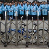 IBM workers protest at an IBM factory in Shenzhen, Guangdong province, March 7, 2014. REUTERS/Alex Lee IBM workers protest at an IBM factory in Shenzhen, Guangdong province, March 7, 2014. REUTERS/Alex Lee