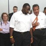 New Jersey Governor Chris Christie (R) talks with Department of Community Affairs Commissioner Richard Constable and CEO of the New Jersey E New Jersey Governor Chris Christie (R) talks with Department of Community Affairs Commissioner Richard Constable and CEO of the New Jersey E