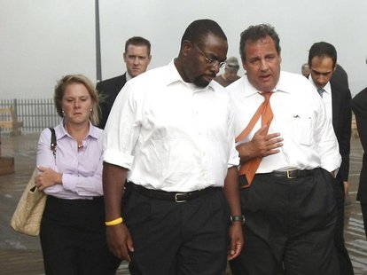 New Jersey Governor Chris Christie (R) talks with Department of Community Affairs Commissioner Richard Constable and CEO of the New Jersey E New Jersey Governor Chris Christie (R) talks with Department of Community Affairs Commissioner Richard Constable and CEO of the New Jersey E