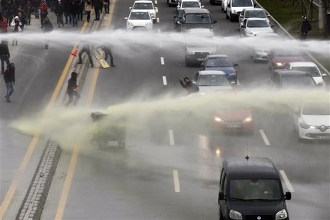 Riot police use water cannon to disperse anti-government protesters near the Middle East Technical University (ODTU) in Ankara March 11, 201 Riot police use water cannon to disperse anti-government protesters near the Middle East Technical University (ODTU) in Ankara March 11, 201