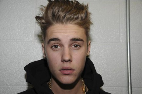 Canadian pop singer Justin Bieber is pictured in police custody in Miami Beach, Florida January 23, 2014 in this Miami Beach Police Departme Canadian pop singer Justin Bieber is pictured in police custody in Miami Beach, Florida January 23, 2014 in this Miami Beach Police Departme