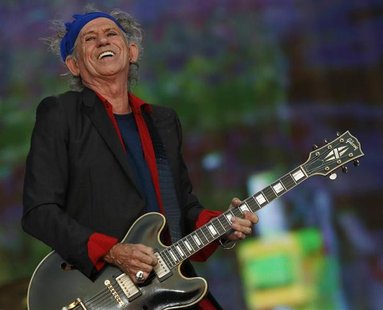 Keith Richards of the Rolling Stones performs at the British Summer Time Festival in Hyde Park in London July 6, 2013. REUTERS/Luke MacGrego Keith Richards of the Rolling Stones performs at the British Summer Time Festival in Hyde Park in London July 6, 2013. REUTERS/Luke MacGrego
