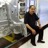 Fiat Chief Executive Sergio Marchionne poses during a visit at the carmaker's Sevelsud plant in Atessa, central Italy, July 9, 2013. REUTERS Fiat Chief Executive Sergio Marchionne poses during a visit at the carmaker's Sevelsud plant in Atessa, central Italy, July 9, 2013. REUTERS