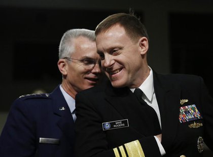 U.S. Navy Vice Admiral Michael Rogers (R) and U.S. Air Force General Paul Selva chat before giving testimonies at the Senate Armed Services U.S. Navy Vice Admiral Michael Rogers (R) and U.S. Air Force General Paul Selva chat before giving testimonies at the Senate Armed Services