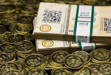 Some of Bitcoin enthusiast Mike Caldwell's coins and paper vouchers, often called "paper wallets", are pictured at his office in this photo Some of Bitcoin enthusiast Mike Caldwell's coins and paper vouchers, often called "paper wallets", are pictured at his office in this photo