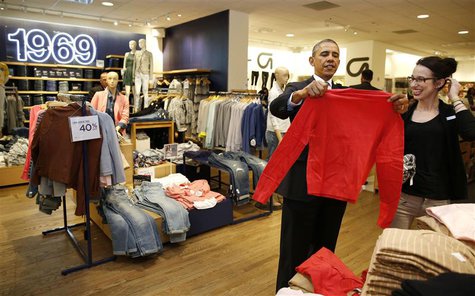U.S. President Barack Obama looks for gifts for his family with salesperson Susan Panariello after stopping off at the GAP in New York, Marc U.S. President Barack Obama looks for gifts for his family with salesperson Susan Panariello after stopping off at the GAP in New York, Marc