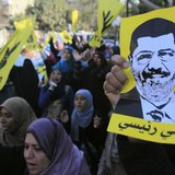 Supporters of the Muslim Brotherhood and ousted Egyptian President Mohamed Mursi shout slogans against the military and interior ministry wh Supporters of the Muslim Brotherhood and ousted Egyptian President Mohamed Mursi shout slogans against the military and interior ministry wh