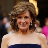 Co-Chair of Disney Media and President of the Disney/ABC Television Group Anne Sweeney arrives on the red carpet at the 86th Academy Awards Co-Chair of Disney Media and President of the Disney/ABC Television Group Anne Sweeney arrives on the red carpet at the 86th Academy Awards