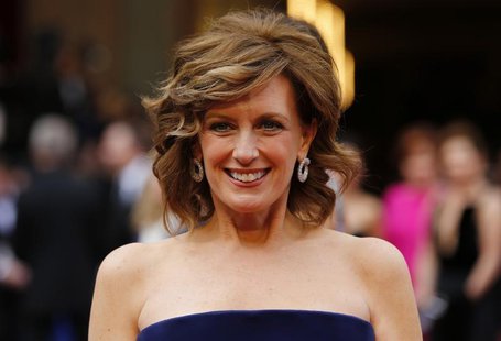 Co-Chair of Disney Media and President of the Disney/ABC Television Group Anne Sweeney arrives on the red carpet at the 86th Academy Awards Co-Chair of Disney Media and President of the Disney/ABC Television Group Anne Sweeney arrives on the red carpet at the 86th Academy Awards