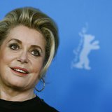 Cast member Catherine Deneuve poses during a photocall to promote the movie "Dans La Cour (In the Courtyard)" at the 64th Berlinale Internat Cast member Catherine Deneuve poses during a photocall to promote the movie "Dans La Cour (In the Courtyard)" at the 64th Berlinale Internat