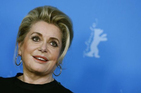 Cast member Catherine Deneuve poses during a photocall to promote the movie "Dans La Cour (In the Courtyard)" at the 64th Berlinale Internat Cast member Catherine Deneuve poses during a photocall to promote the movie "Dans La Cour (In the Courtyard)" at the 64th Berlinale Internat