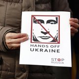 People take part in a demonstration showing support for Ukraine outside the Convention Centre where the European People's Party (EPP) Electi People take part in a demonstration showing support for Ukraine outside the Convention Centre where the European People's Party (EPP) Electi