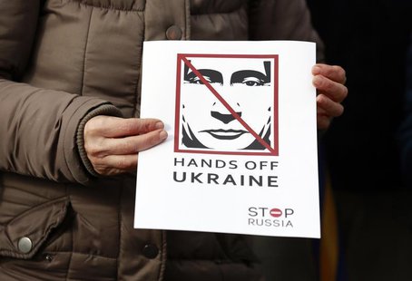 People take part in a demonstration showing support for Ukraine outside the Convention Centre where the European People's Party (EPP) Electi People take part in a demonstration showing support for Ukraine outside the Convention Centre where the European People's Party (EPP) Electi