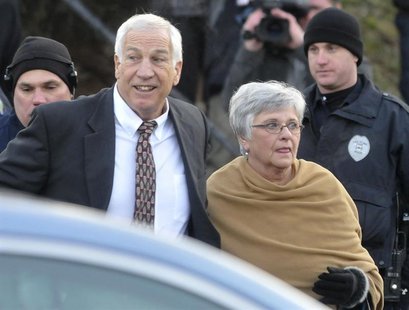 Former Penn State assistant football coach Jerry Sandusky (L) and his wife Dottie arrive for a preliminary hearing to determine if there is Former Penn State assistant football coach Jerry Sandusky (L) and his wife Dottie arrive for a preliminary hearing to determine if there is