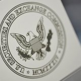 The U.S. Securities and Exchange Commission logo adorns an office door at the SEC headquarters in Washington, June 24, 2011. REUTERS/Jonatha The U.S. Securities and Exchange Commission logo adorns an office door at the SEC headquarters in Washington, June 24, 2011. REUTERS/Jonatha