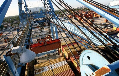 Crews load and unload consumer products at the Port of New Orleans along the Mississippi River in New Orleans, Louisiana June 23, 2010. REUT Crews load and unload consumer products at the Port of New Orleans along the Mississippi River in New Orleans, Louisiana June 23, 2010. REUT