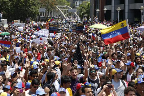 Anti-government protesters march during a demonstration in Caracas March 12, 2014.REUTERS/Carlos Garcia Rawlins Anti-government protesters march during a demonstration in Caracas March 12, 2014.REUTERS/Carlos Garcia Rawlins