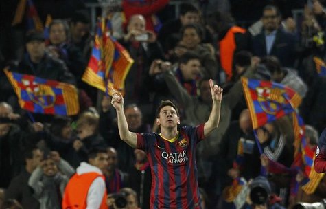 Barcelona's Lionel Messi celebrates after scoring a goal against Manchester City during their Champions League last 16 second leg soccer mat Barcelona's Lionel Messi celebrates after scoring a goal against Manchester City during their Champions League last 16 second leg soccer mat