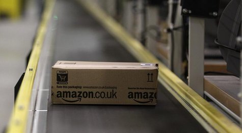 A parcel travels along a conveyer belt at Amazon's new distribution center in Brieselang, near Berlin November 28, 2013. REUTERS/Tobias Schw A parcel travels along a conveyer belt at Amazon's new distribution center in Brieselang, near Berlin November 28, 2013. REUTERS/Tobias Schw